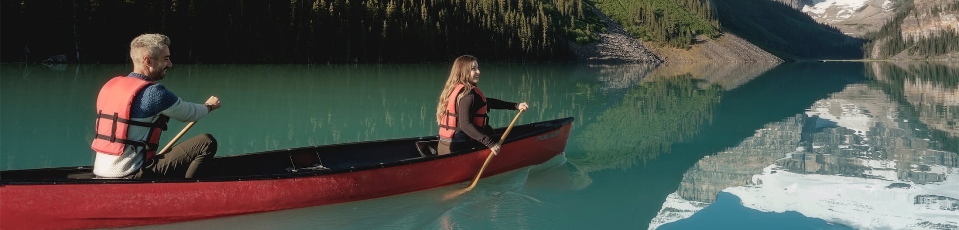 couple canoeing on the lake