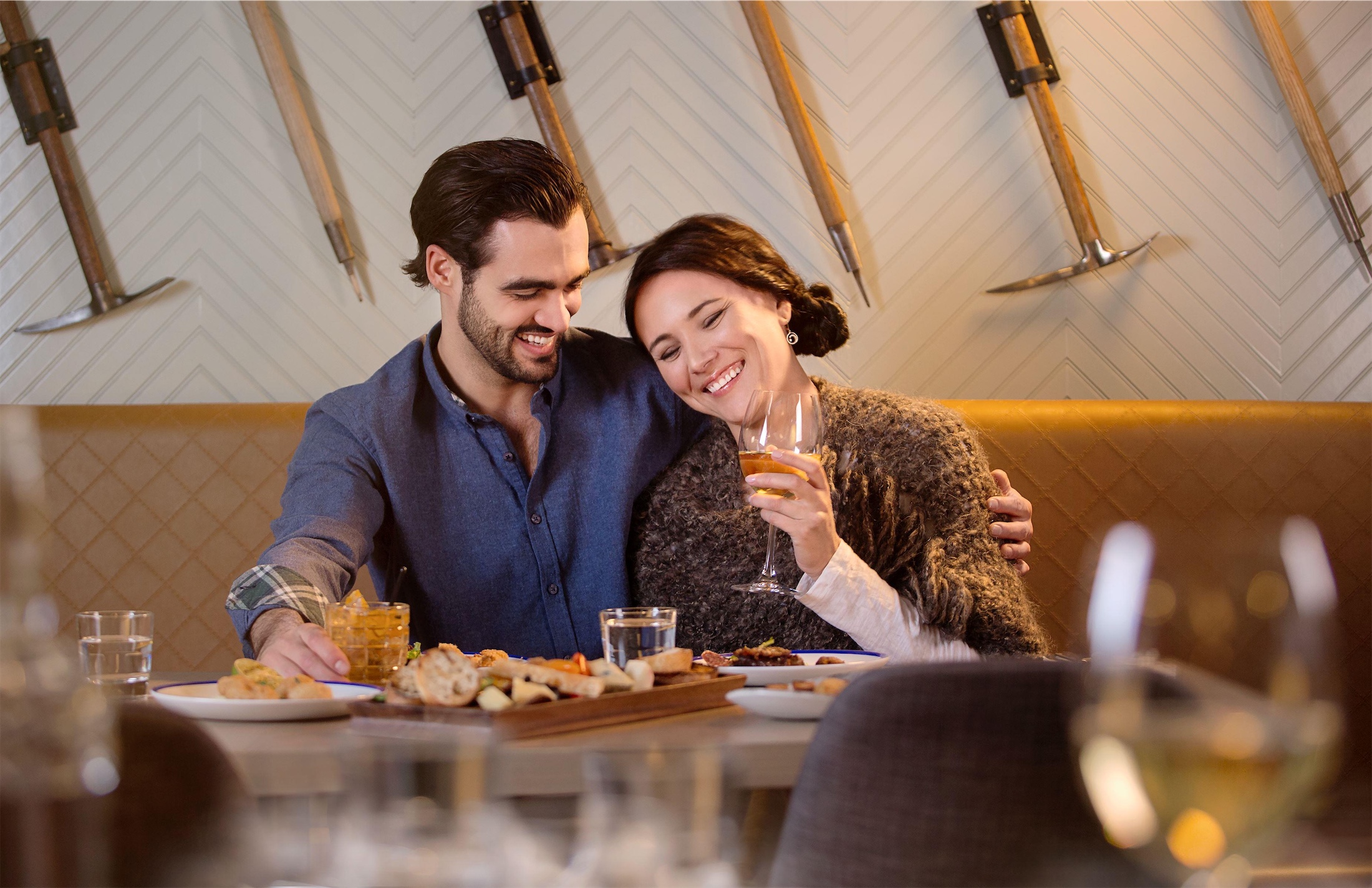 couple sharing a charcuterie board