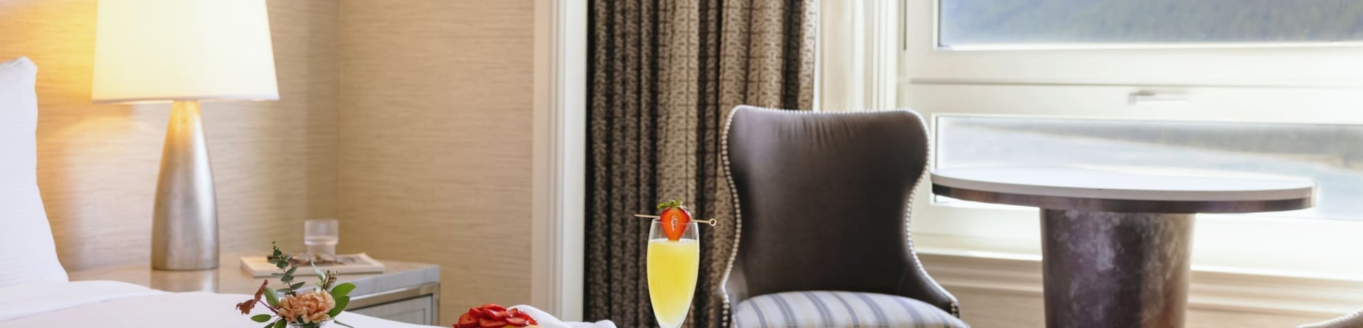 tray of breakfast on a bed