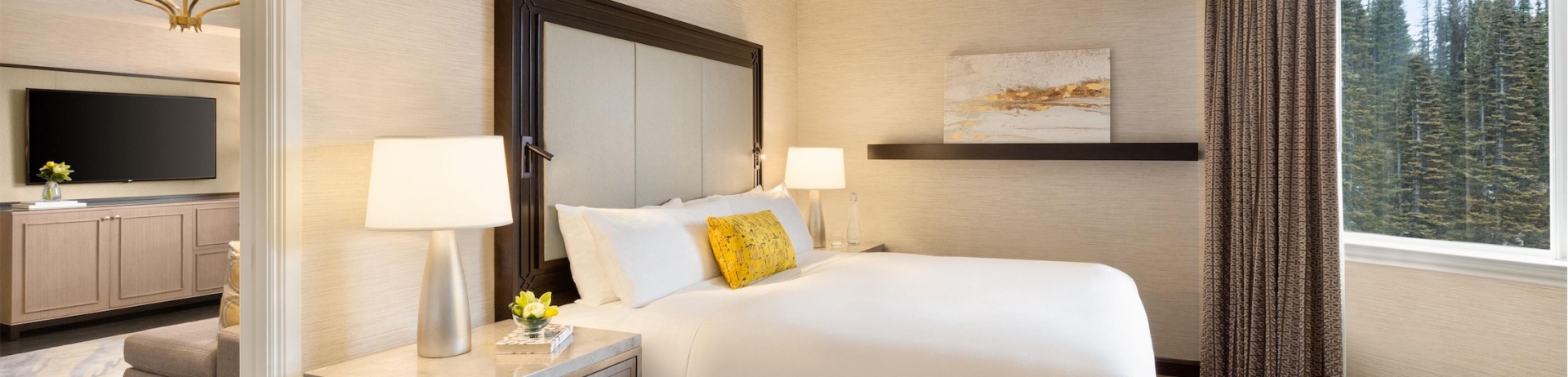 bedroom with view of living room