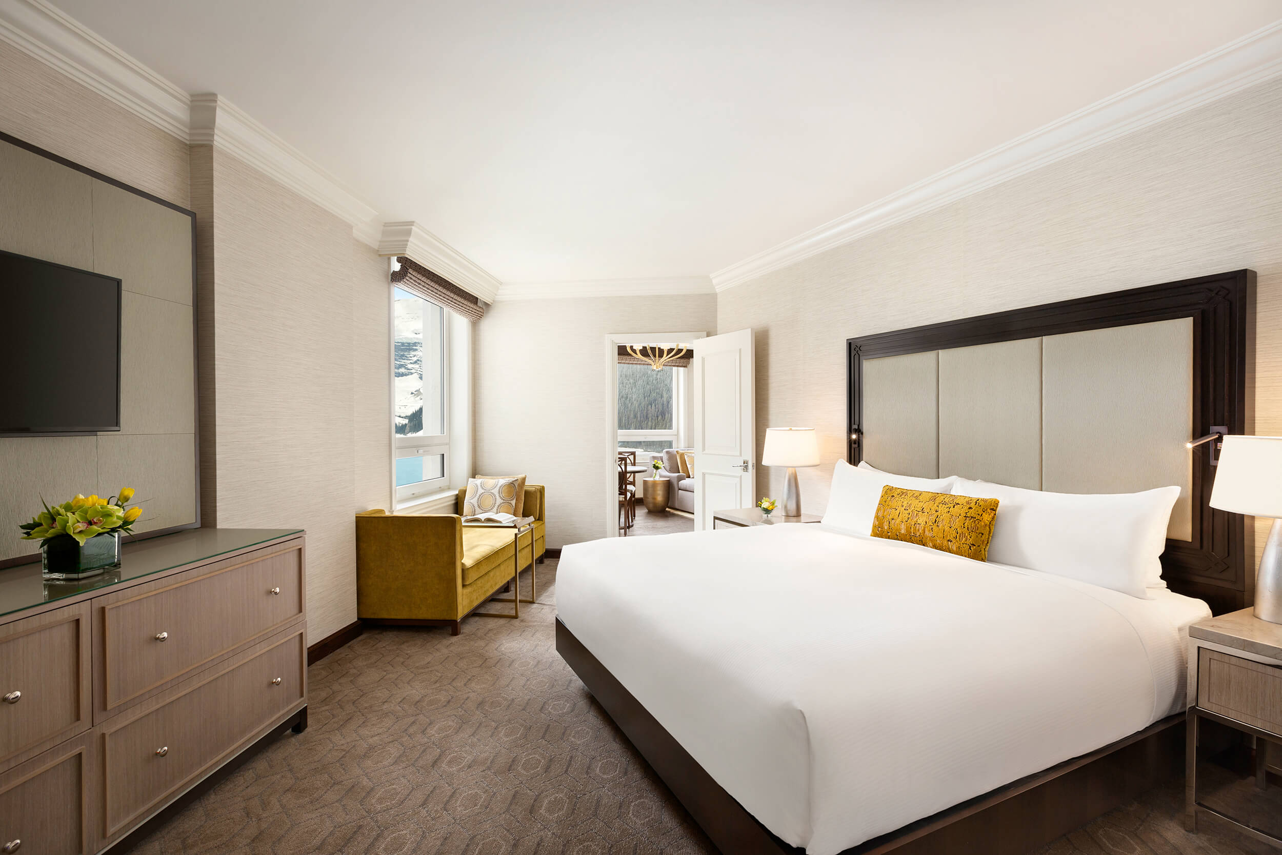 bedroom with chaise lounge under the window