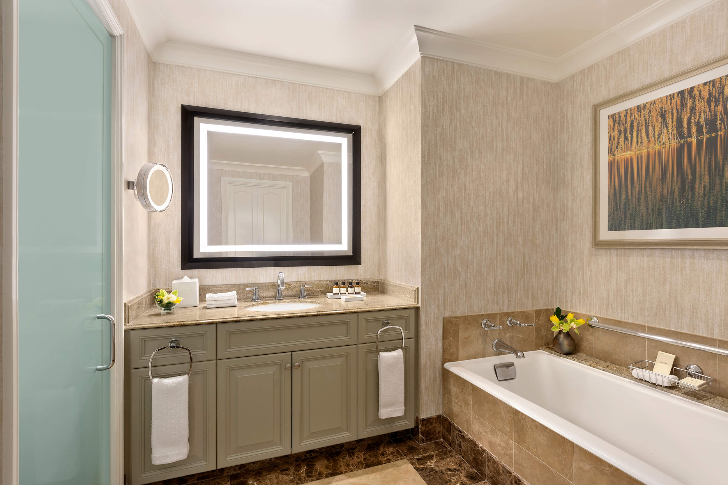 bathroom with shower and bathtub