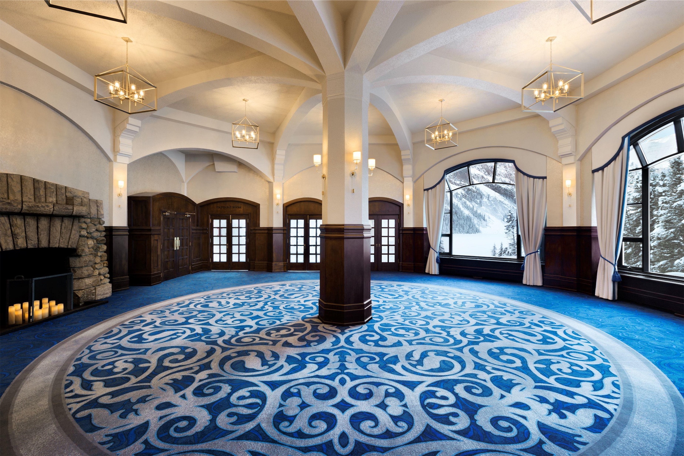 Fairmont Chateau Lake Louise's Sun Room venue with fireplace