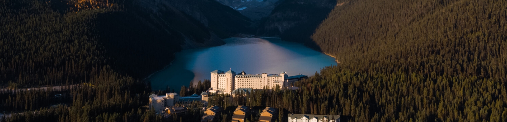 Chateau Lake Louse surrounded by mountains