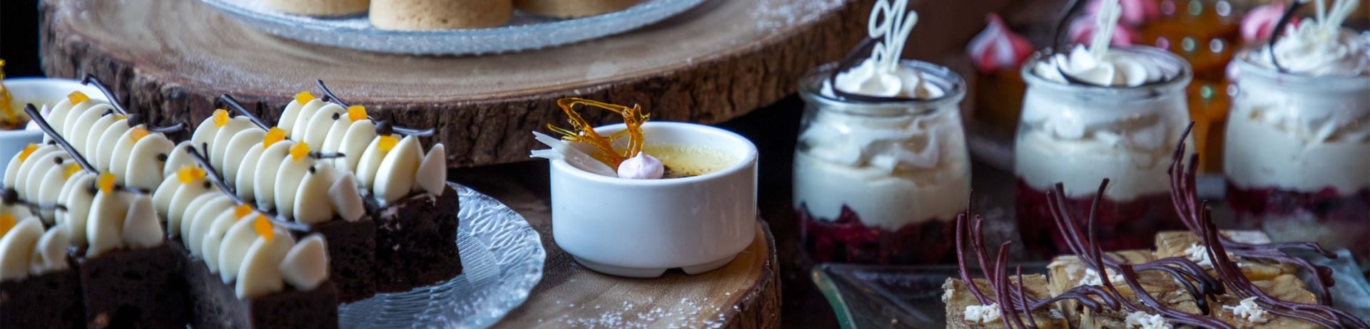 A table loaded with a variety of pastries and sweets