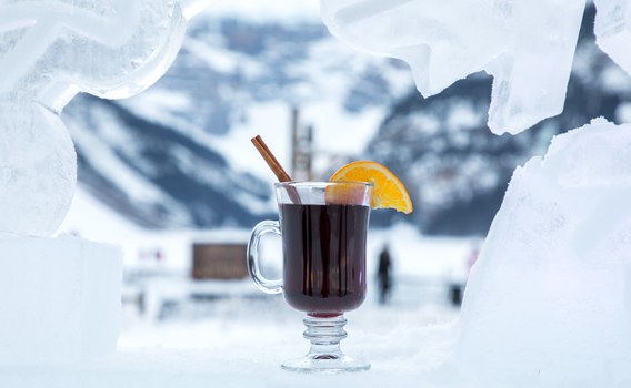 brown cocktail sits on a table