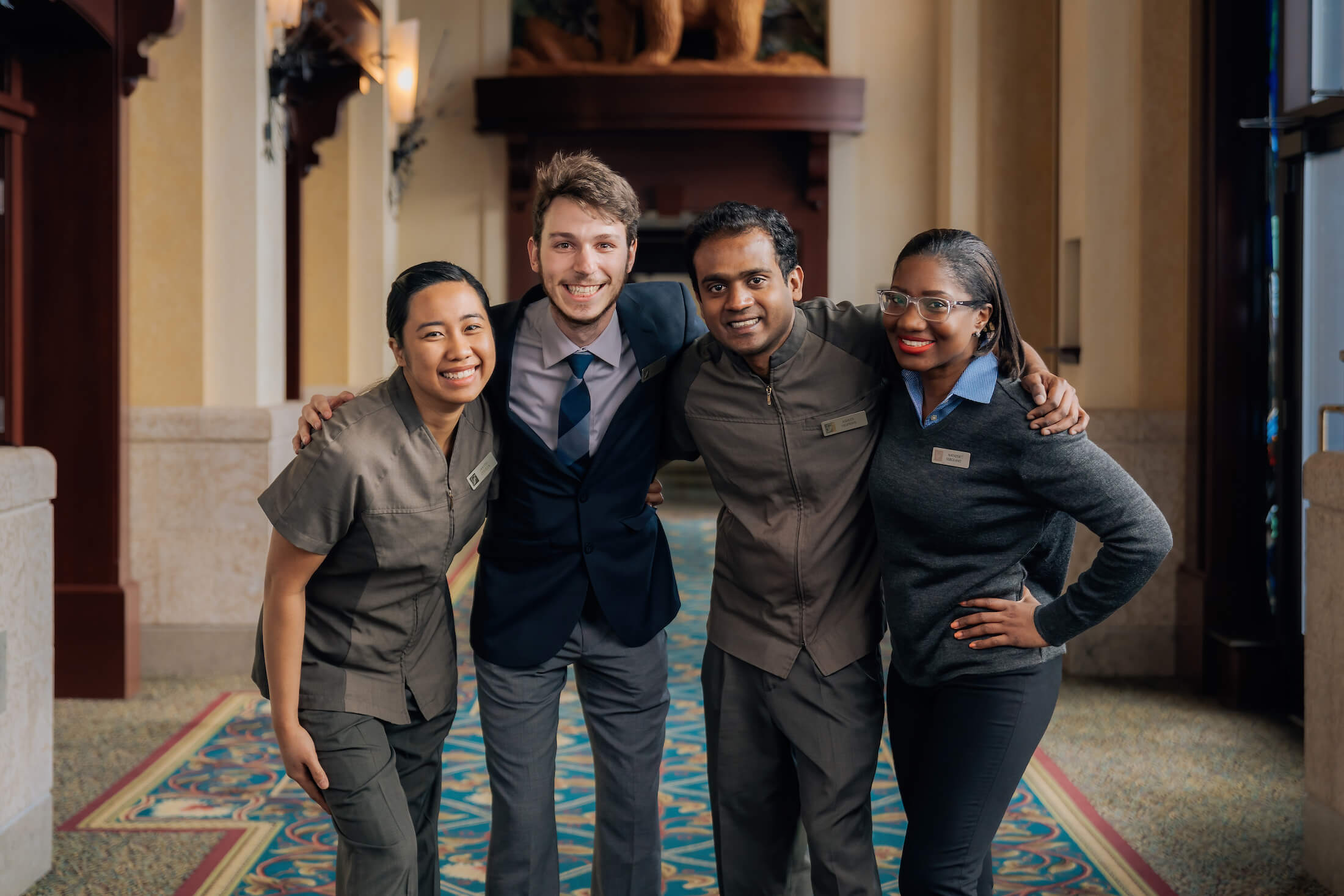 group of people in hotel uniforms 
