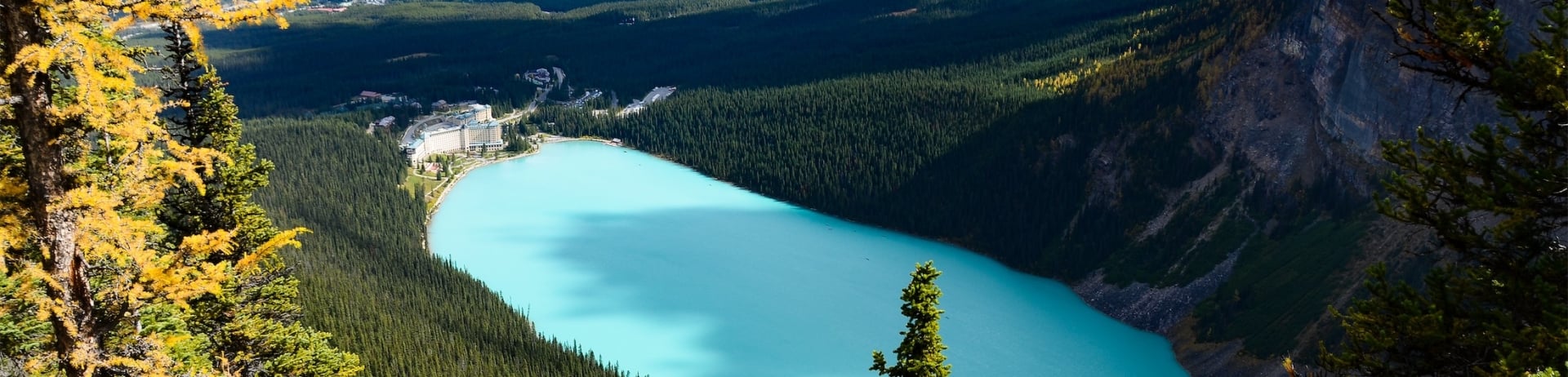 view of lake and wooded mountain area