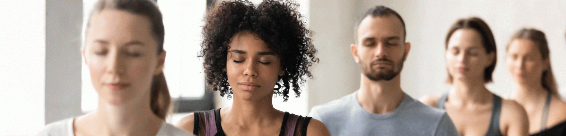 Group of people doing Yoga