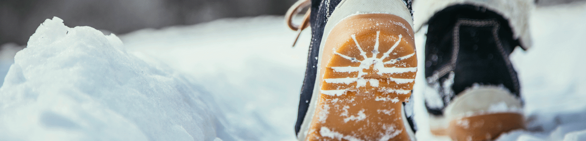 Winter boots walking in snow