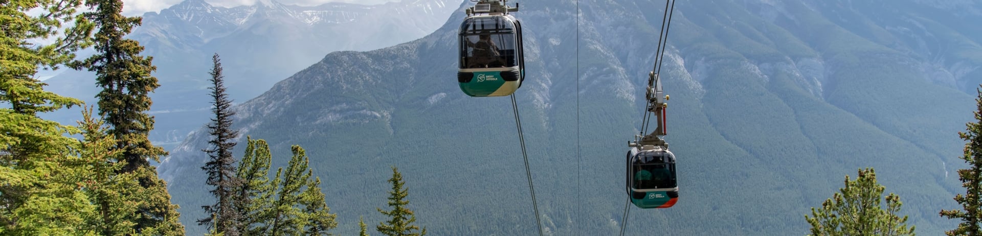 Banff Gondola - Gondolas going up mountain