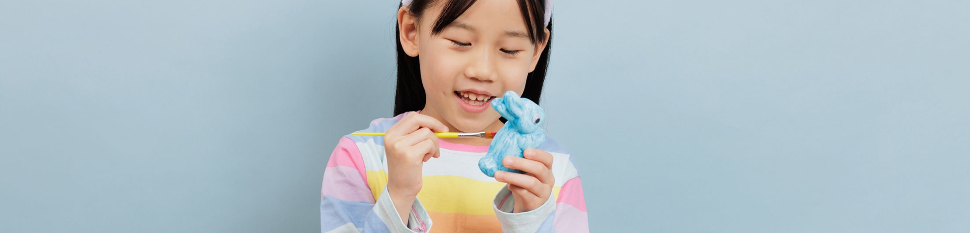 Child making easter craft
